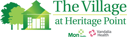 the village at heritage point logo